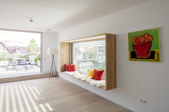 Mehrfamilienhaus mit innenliegenden Garagen