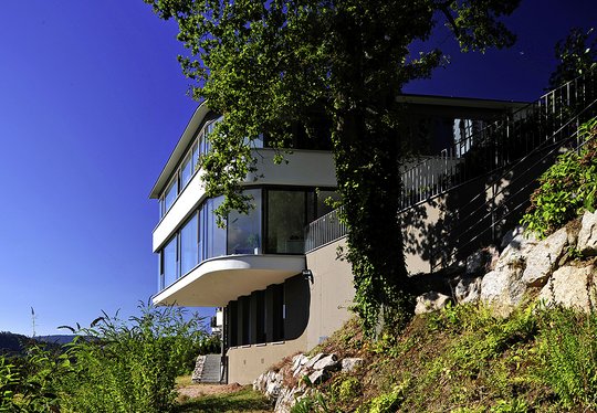 Neubau eines Einfamilienhauses mit Einliegerwohnung und Praxisräumen