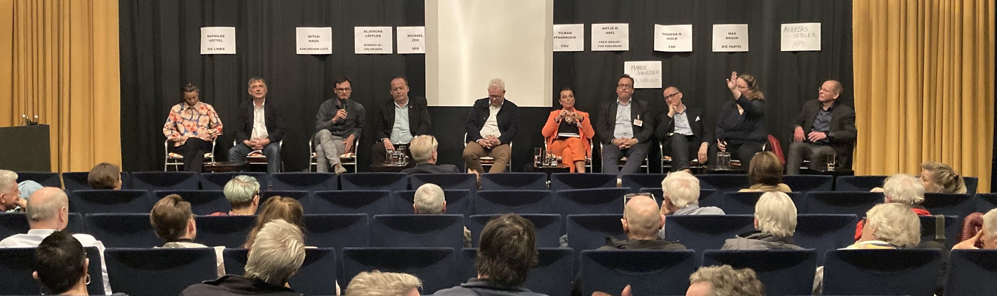 Foto: Olivia Gaiser-Delgmann, 4.Mai 2024, auf dem Podium v.l.: Mathilde Göttel (die Linke), Mitch Haug (KAL), Aljoscha Löffler (Bündnis 90/ die Grünen), Michael Zeh (SPD), Tilman Pfannkuch (CDU), Antje Abel (FW), Markus Schneider (FÜR), Thomas Hock (FDP), Vanessa Schulz (die PARTEI), Andreas Seidler (AFD)
